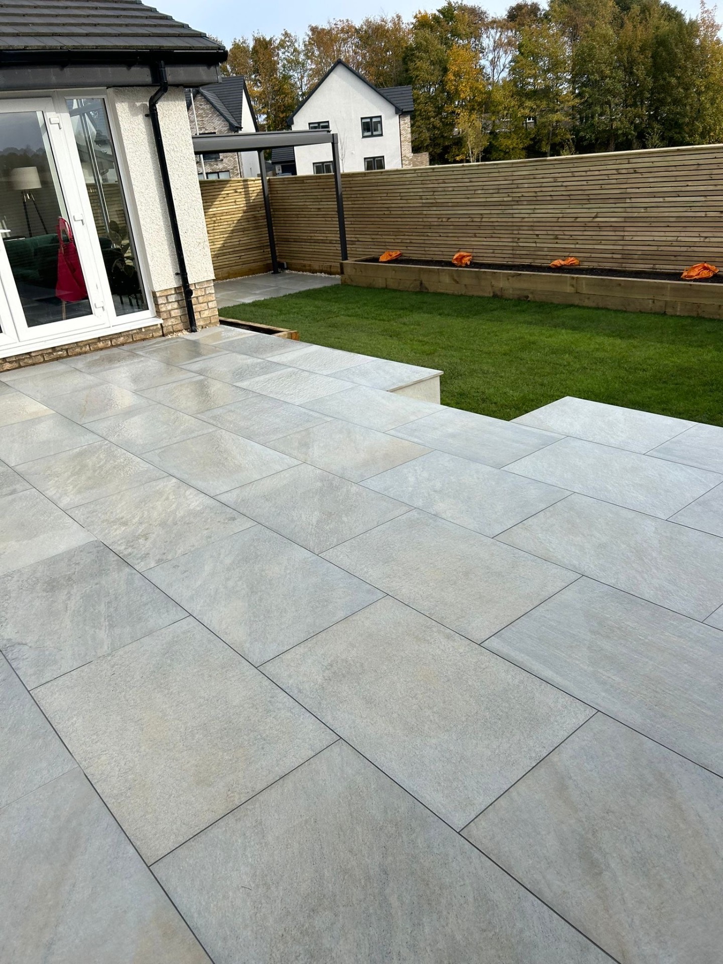 Modern porcelain patio installation with clean lines and contemporary design