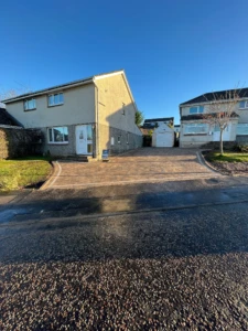 "Transforming Currie, Edinburgh with a Contemporary Touch: The Captivating Tobermore Tegula Bracken Driveway with Sienna Silver Border" "Stunning Tobermore Tegula Bracken Driveway with Sienna Silver Border in Currie, Edinburgh"